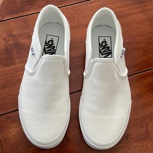 Women’s White Vans Slip Ons, brand new never worn, size 7.